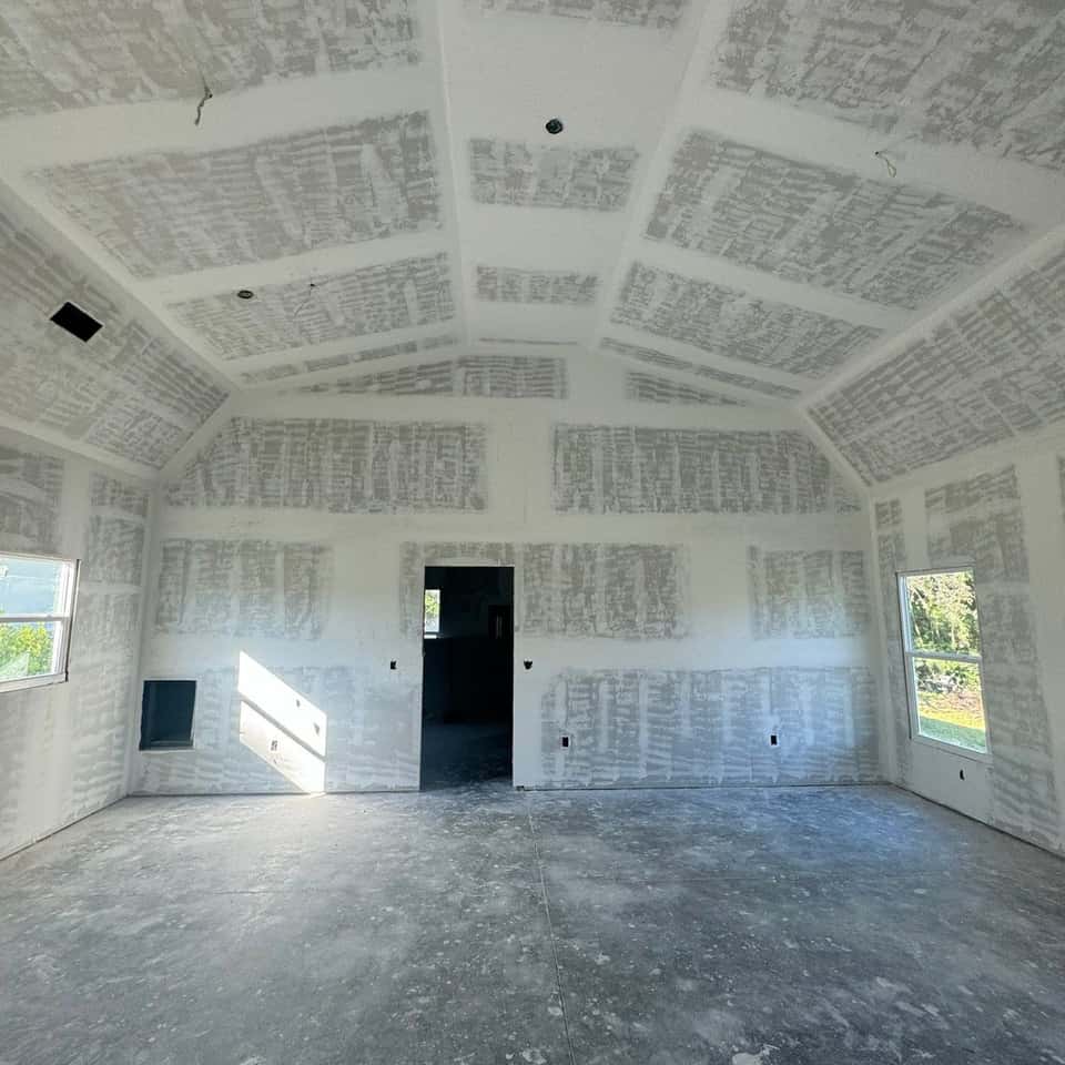 Taped and mudded vaulted-ceiling room, ready for finish — Cristian House Remodeling LLC